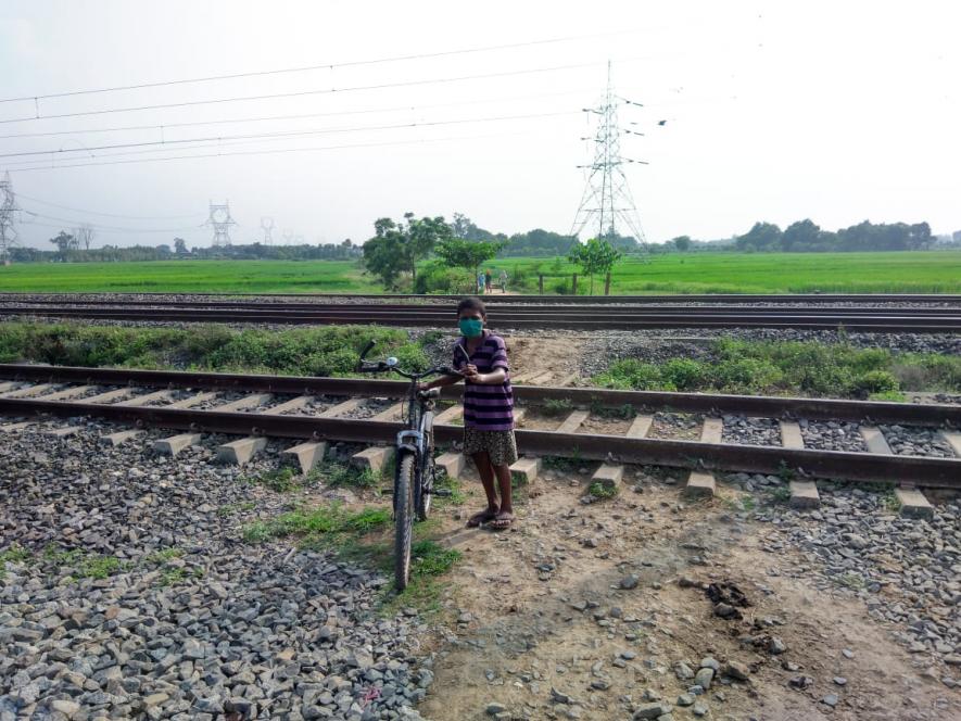 A man crossing the railway track in Bhitti village..jpeg