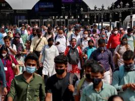 दस प्रतिशत से अधिक कोविड संक्रमण दर वाले ज़िलों में सख़्त पाबंदियों पर विचार करें: केन्द्र