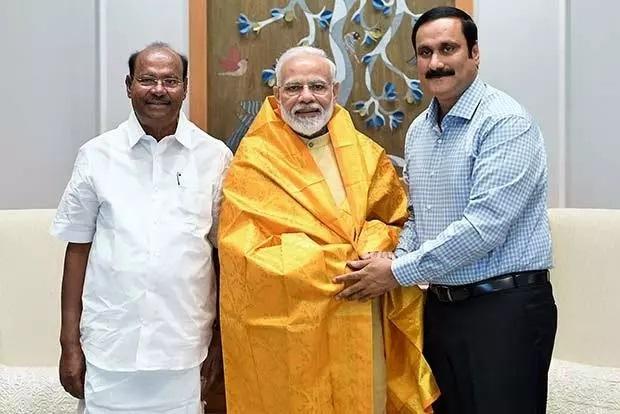 PMK founder S. Ramadoss (left) and Dr. Anbumani Ramadoss (right) with PM Narendra Modi