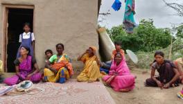 Indubai Gailwad( Old Lady in Yellow Sari in Middle) at Bhil Hamlet at Alegoan Paga village in Pune